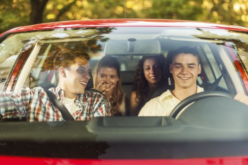 University of Michigan Student sitting in a car, Visual concept for a personal injury blog discussing what to do if your University of Michigan Student was hurt in a car accident.